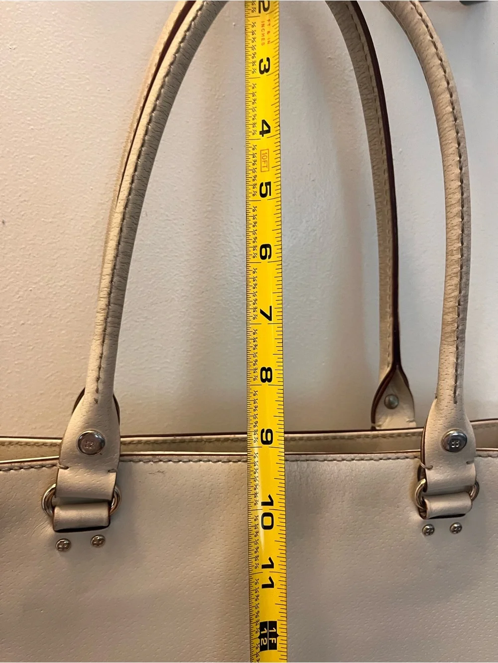 kate spade cream leather tote with gold-tone logo